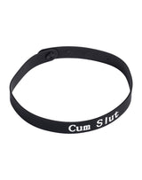 Rimba Latex Play - Halsband met opschrift 'Cum Slut' - Zwart & Wit
